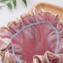 Close-up of pink and beige gathered shower cap lining
