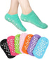 Pink and blue silicone gel spa socks showing gripped soles