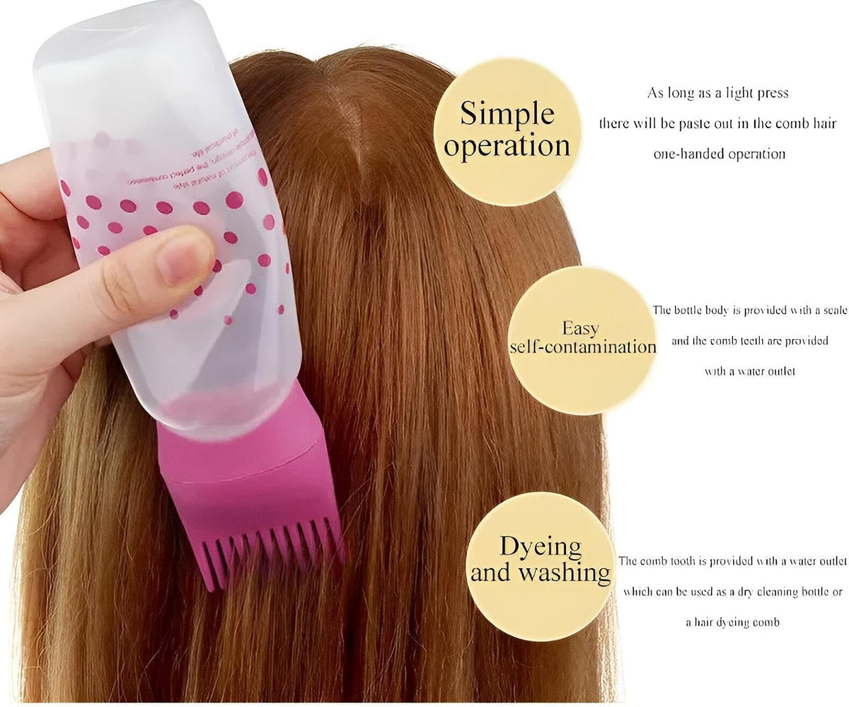 Pink comb-tip hair oil applicator bottle being used on hair